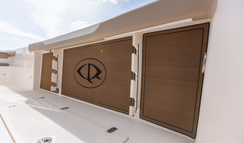 gunwale-coaming-cushions-with-rod-holders-below-fish-logo-accent-pad